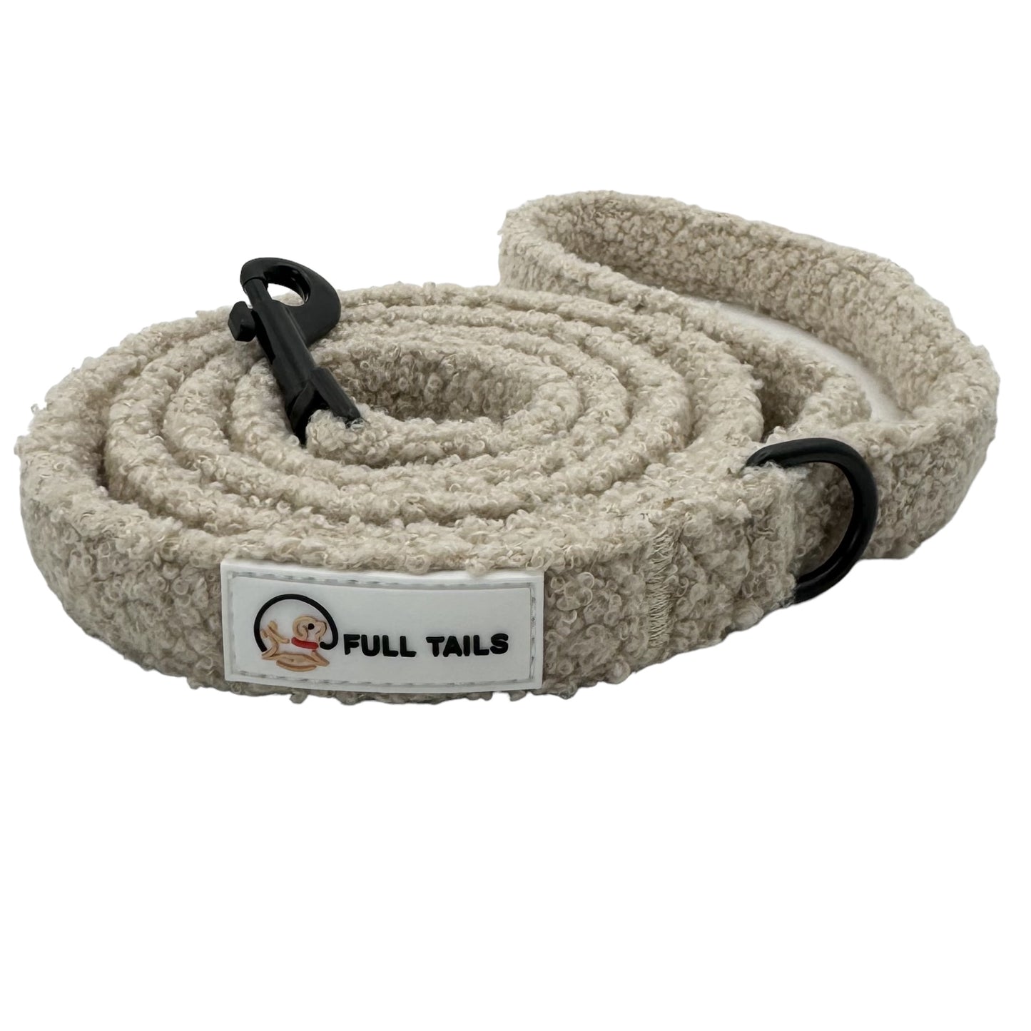 A beige teddy-textured dog leash with a padded handle and a metal clasp, featuring the brand label 'FULL TAILS' on a white label.