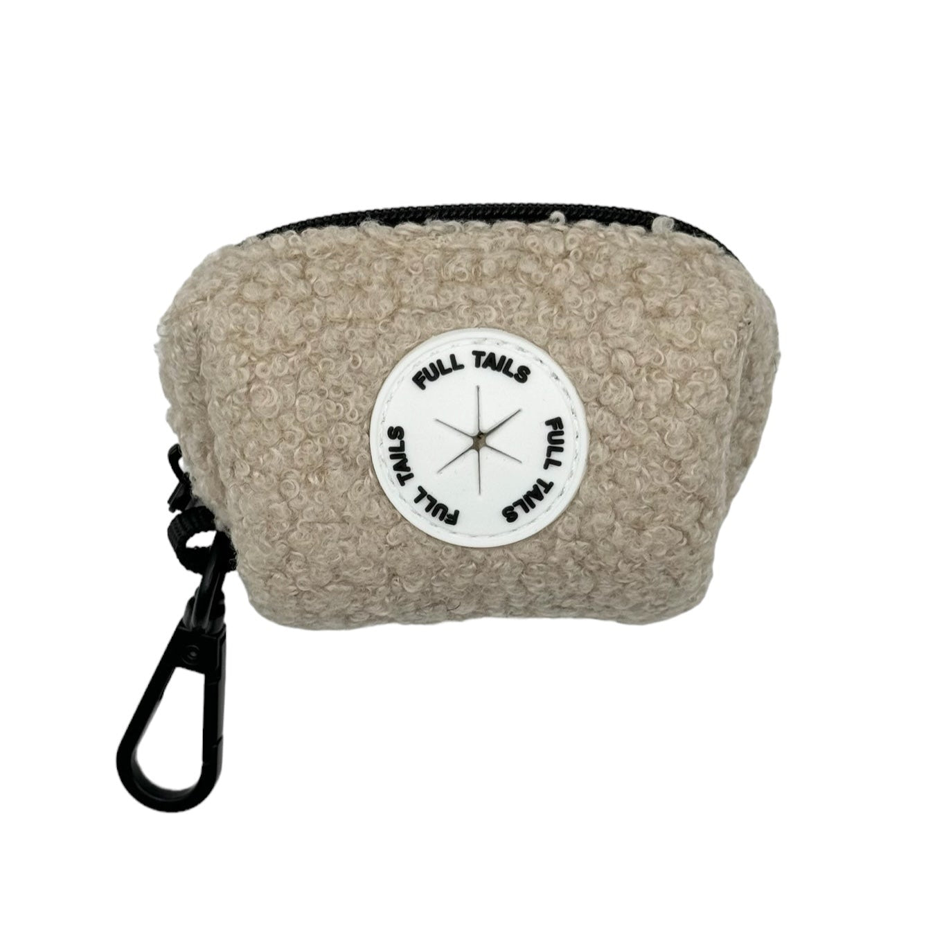 A beige dog poop bag holder with a black strap and a label in the center displaying a compass.